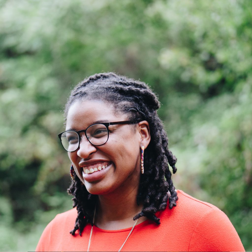 Headshot of persona Communications Corrie